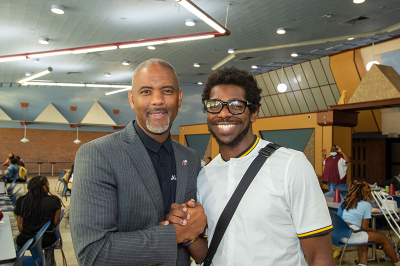 SIU Chancellor Austin Lane with Upward Bound Student